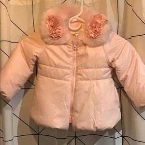 Pink coat with fair fur